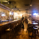 Waiters and bartenders clean up bars and restaurants along North High Street in the Short North District on March 15, 2020, in Columbus, Ohio.